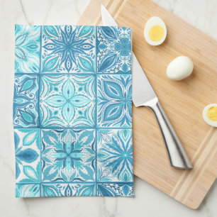 Ornate tiles in blue and white tea towel