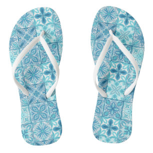 Ornate tiles in blue and white thongs