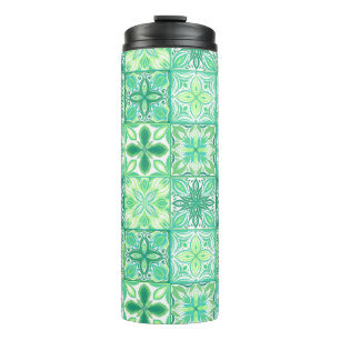 Ornate tiles in green and white thermal tumbler