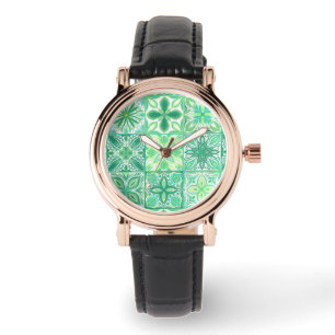 Ornate tiles in green and white watch