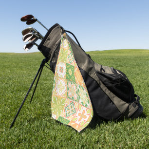 Ornate tiles in green and yellow golf towel