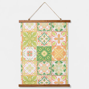 Ornate tiles in green and yellow hanging tapestry