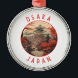Osaka Japan Retro Distressed Circle Metal Ornament<br><div class="desc">Osaka retro vector travel design. It's known for its modern architecture,  nightlife and hearty street food. The 16th-century shogunate Osaka Castle,  which has undergone several restorations,  is its main historical landmark.</div>
