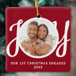 Our 1st Christmas Engaged Photo Red Keepsake Ceramic Ornament<br><div class="desc">This keepsake First Christmas Engaged photo ornament is decorated with the word JOY in stylish script typography on a red background. Easily customisable.</div>
