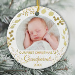 Our First Christmas As Grandparents Gold Photo Ceramic Ornament<br><div class="desc">This elegant Grandparents Christmas Ornament is decorated with gold foliage on a white background.
Easily customisable with baby's photo and year.
Original Watercolor © Michele Davies.</div>