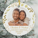 Our First Christmas Engaged Gold Foliage Photo Ceramic Ornament<br><div class="desc">This elegant Engagement Christmas Ornament is decorated with gold foliage on a white background.
Easily customisable with your photo,  names,  and year.
Original Watercolor © Michele Davies.</div>
