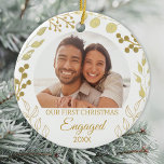 Our First Christmas Engaged Gold Foliage Photo Ceramic Ornament<br><div class="desc">This elegant Engagement Christmas Ornament is decorated with gold foliage on a white background.
Easily customisable with your photo and year.
Original Watercolor © Michele Davies.</div>