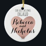 Our first Christmas Engaged ornament Rose gold<br><div class="desc">Our first Christmas Engaged or Together ornament featuring a beautiful rose gold heart! Personalised with your names in Script Typographic font.</div>