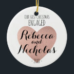 Our first Christmas Engaged ornament Rose gold<br><div class="desc">Our first Christmas Engaged or Together ornament featuring a beautiful rose gold heart! Personalised with your names in Script Typographic font.</div>