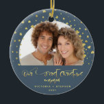 Our First Christmas Engaged Photo Gold Confetti  Ceramic Ornament<br><div class="desc">Elegant design features Our First Christmas Engaged in a flowing gold script with your beautiful photo against a muted navy blue background with gold-foil confetti stars. Easily customise your name and date on the back of the ornament. A beautiful memento for the engaged couple to keep always, and the perfect...</div>