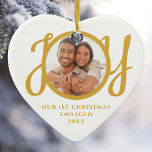 Our First Christmas Engaged Photo Heart-Shaped Ceramic Ornament<br><div class="desc">This keepsake heart-shaped First Christmas Engaged photo ceramic ornament is decorated with the word JOY in stylish gold script typography. Easily customisable.</div>
