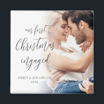 Our First Christmas Engaged Photo Names Keepsake  Magnet<br><div class="desc">Our First Christmas Engaged Custom Photo Names Year Keepsake. A fully customisable design especially to celebrate the happy couple’s first Christmas after their engagement. A beautiful calligraphy script for the header text. Easily personalise with your names and the year and replace the sample photo with your own. A gradient overlay...</div>
