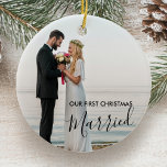 Our First Christmas Married Personalised Photo Ceramic Ornament<br><div class="desc">Christmas keepsake ornament for your first christmas married. The photo template is set up for you to add one of your favourite wedding pictures to the front with your names and the year on the back. The design features elegant script calligraphy and modern typography. This design is available with black...</div>