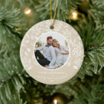 Our First Christmas Photo Ivory Ceramic Ornament<br><div class="desc">Round ceramic Christmas tree ornament features your favourite photo surrounded with white leaves, berries and dots on an ivory background on the front and back. TIP: Upload a high resolution, photo that features you in the middle. Ornaments make memorable gifts for family and friends or create for yourself. MORE colours...</div>
