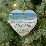 Our First Christmas Together Mr Mrs Beach Wedding Ceramic Ornament<br><div class="desc">Custom personalised names and year. Our Firt Christmas as Mr. and Mrs. Beach wedding ornament. Remember a beach wedding or honeymoon with this keepsake wedding ornament. First Christmas together with two interlocking beach wedding hearts drawn in the sand makes an elegant tropical ocean coastal nautical theme wedding, matching set of...</div>