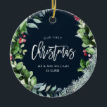 our first christmas winter wreath ceramic ornament<br><div class="desc">christmas wreath with a blue background and white script text. The text and colours and image at the back can be personalised.</div>