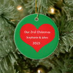 Our Second Christmas Together 2023 Cute Red Heart  Ceramic Ornament<br><div class="desc">Personalised names and printed with cute red heart design in solid green background. Feel free to customise by adding your own texts,  names or photos. You can add your photo on the back side of the ornament easily!
The colour of the background can also be changed as you want.</div>