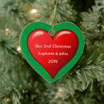 Our Second Christmas Together Cute Red Heart 2019 Ceramic Ornament<br><div class="desc">Personalised names and printed with cute red heart design in solid green background. Feel free to customise by adding your own texts,  names or photos. You can add your photo on the back side of the ornament easily!
The colour of the background can also be changed as you want.</div>