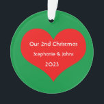 Our Second Christmas Together Red Heart 2023 Cute Ornament<br><div class="desc">Personalised names and printed with cute red heart design in solid green background. Feel free to customise by adding your own texts,  names or photos. You can add your photo on the back side of the ornament easily!
The colour of the background can also be changed as you want.</div>