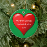 Our Third Christmas Together Cute Red Heart 2019 Ceramic Ornament<br><div class="desc">Personalized names and printed with cute red heart design in solid green background. Feel free to customize by adding your own texts,  names or photos. You can add your photo on the back side of the ornament easily!
The color of the background can also be changed as you want.</div>