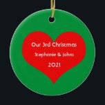 Our Third Christmas Together Cute Red Heart 2021 Ceramic Ornament<br><div class="desc">Personalised names and printed with cute red heart design in solid green background. Feel free to customise by adding your own texts,  names or photos. You can add your photo on the back side of the ornament easily!
The colour of the background can also be changed as you want.</div>