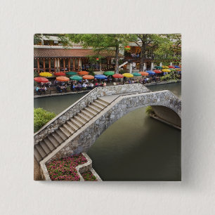 Outdoor cafe along River Walk and bridge over 2 15 Cm Square Badge