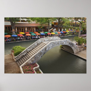 Outdoor cafe along River Walk and bridge over 2 Poster