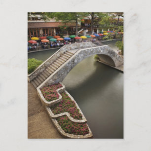 Outdoor cafe along River Walk and bridge over Postcard