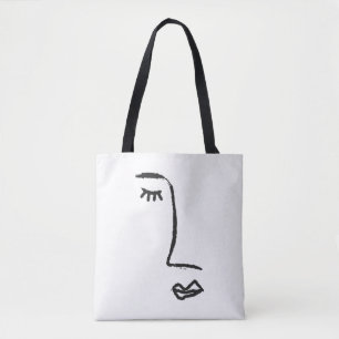 Outline of face painted with a watercolor brush. A Tote Bag