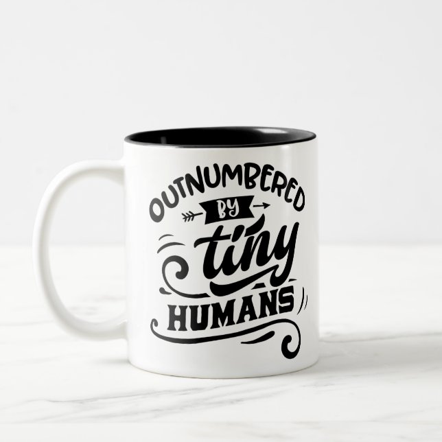 Outnumbered By Tiny Humans Two-Tone Coffee Mug (Left)