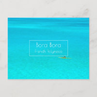 Outrigger canoe in Bora Bora blue lagoon