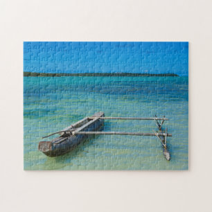 Outrigger Canoe In Shallow Ocean Jigsaw Puzzle