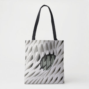 Oval black tint glass panel on white surface tote bag