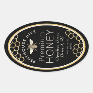 Oval honey label with honeycomb and heraldic bee