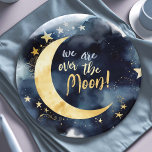 Over the Moon Celestial Baby Shower Stars Space Paper Plate<br><div class="desc">Celebrate the arrival of a new little star with these enchanting baby shower paper plates, featuring a radiant golden moon and shimmering stars on a deep blue space background, all beautifully rendered in watercolors. The header, "We are over the Moon!", adds a touch of joy and excitement to this celestial-themed...</div>