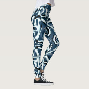 Overlapping curved ribbons, chromed tones on blue  leggings