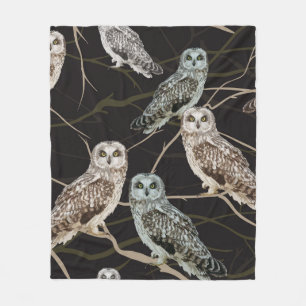 owl sitting on a branch fleece blanket