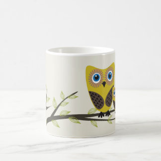 Owls couple on the tree. coffee mug