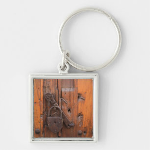 Padlock on wooden door key ring