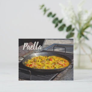 Paella is cooked on a grill gift for chef holiday postcard