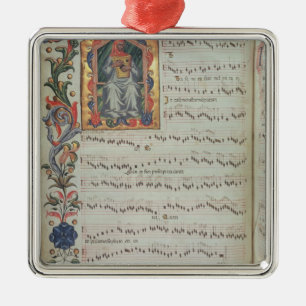 Page of musical notation with historiated metal ornament