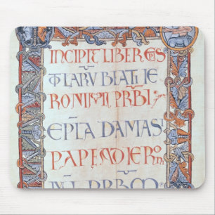 Page of text with a floriated border mouse pad