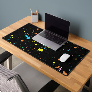 Paint Splatters On Black Desk Mat
