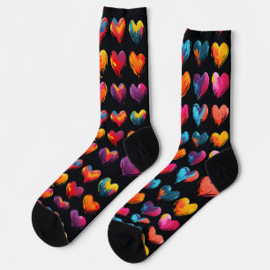 Painted hearts on a black background socks