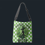 Painted Wickedly Good Witch Green Gingham Plaid Crossbody Bag<br><div class="desc">Painted Wickedly Good Witch Green Gingham Plaid Crossbody Bag - This cross body bag features a green and black painting of a wicked witch in an enchanted forest on top of a white and green gingham chequered plaid pattern. Designed for those who loves dark fantasy and spooky things. Make a...</div>