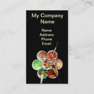 Painter's palette with bright colours and brushes business card