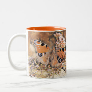 Painting of an orange and black butterfly on flowe Two-Tone coffee mug