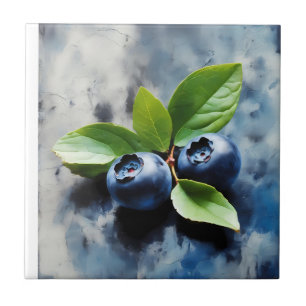 Painting of two blueberries with green leaves ceramic tile