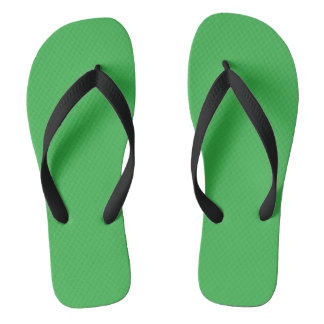 pair of green textured flip-flops with black strap thongs