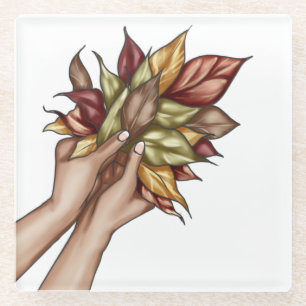 PAIR OF HANDS HOLDING AUTUMN LEAVES GLASS COASTER